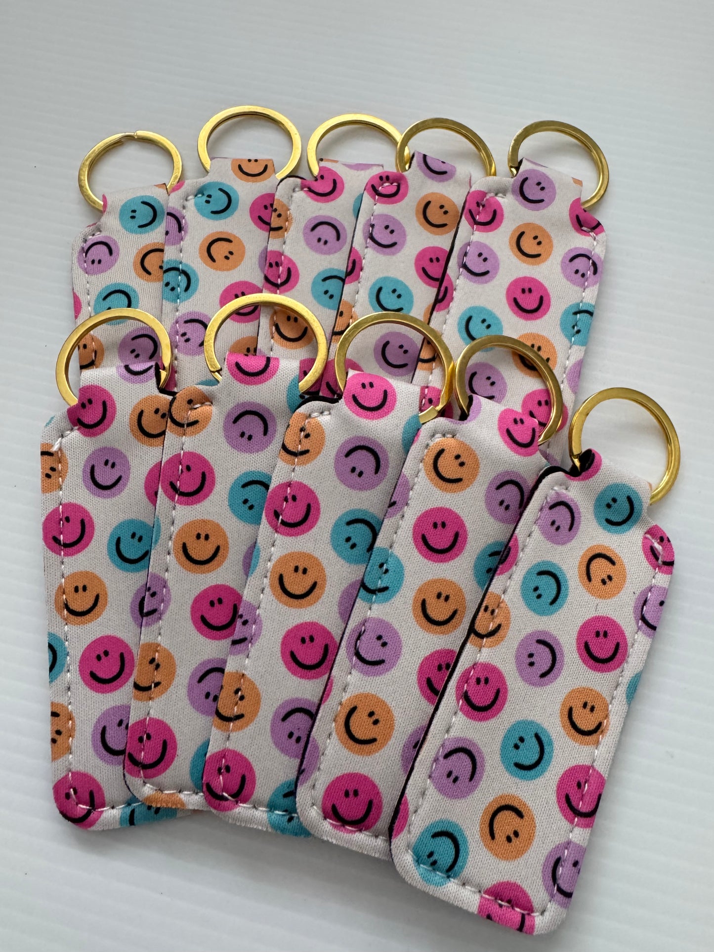 White Happy Faces Chapstick Holder Keychains (Pack of 5)