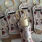Ivory with Maroon Flowers Boot Chapstick Holder Keychains (Pack of 5)